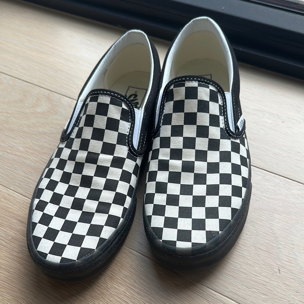 Vans Black and White Checkerboard Slip-On Sneakers. Worn once.  Men’s size 10